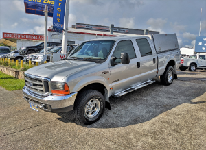 2006 Ford F250 XLT Silver Front Quarter